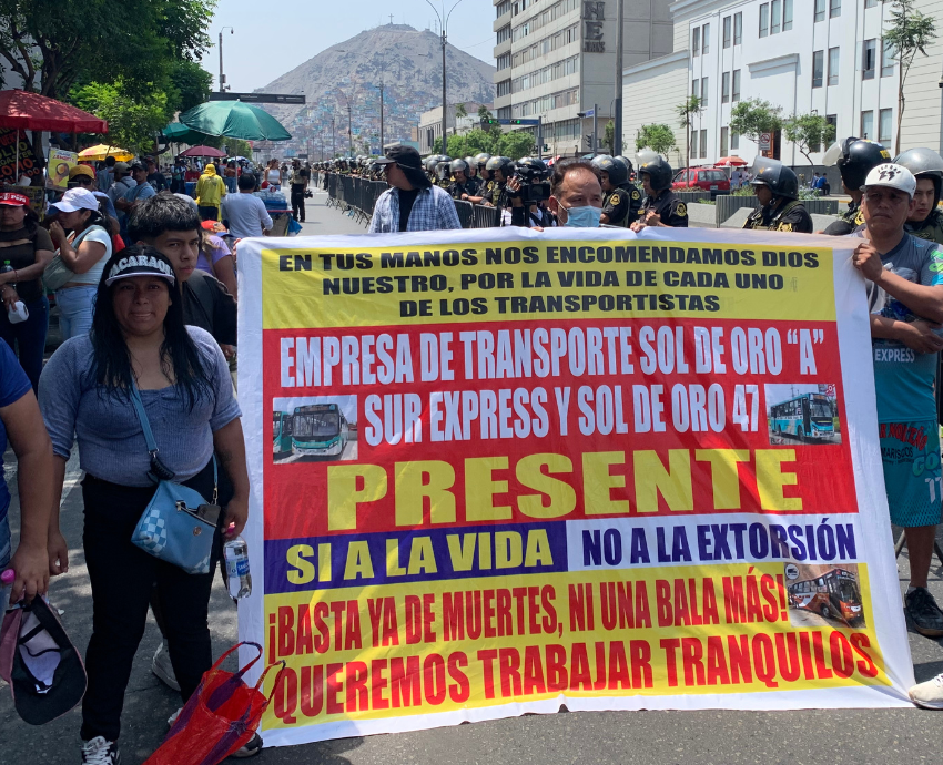 people holding a banner