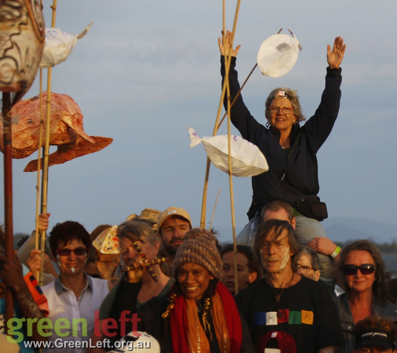 Protester with arms in air