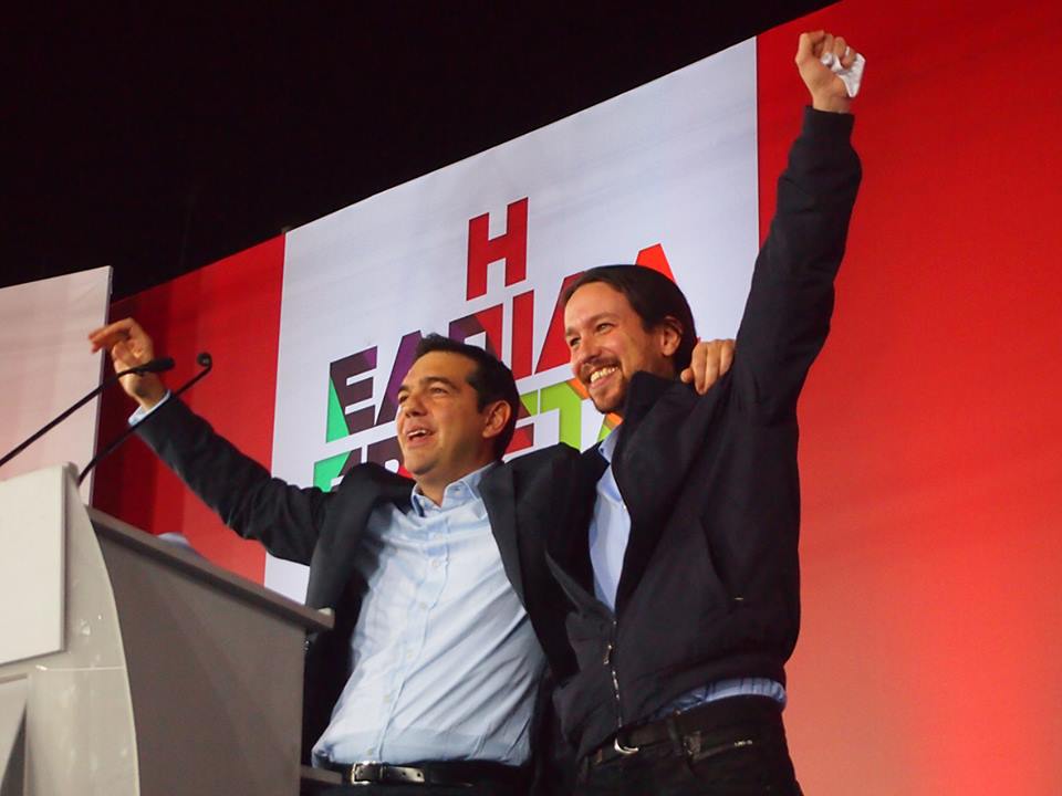 Alexis Tsipras on stage with Pablo Iglesias.