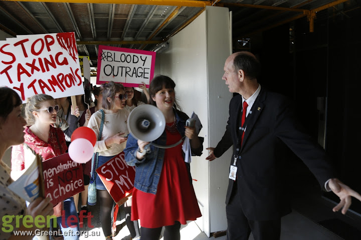 Security blocks the path, Axe the Tax on Tampons rally August 14, 2015.