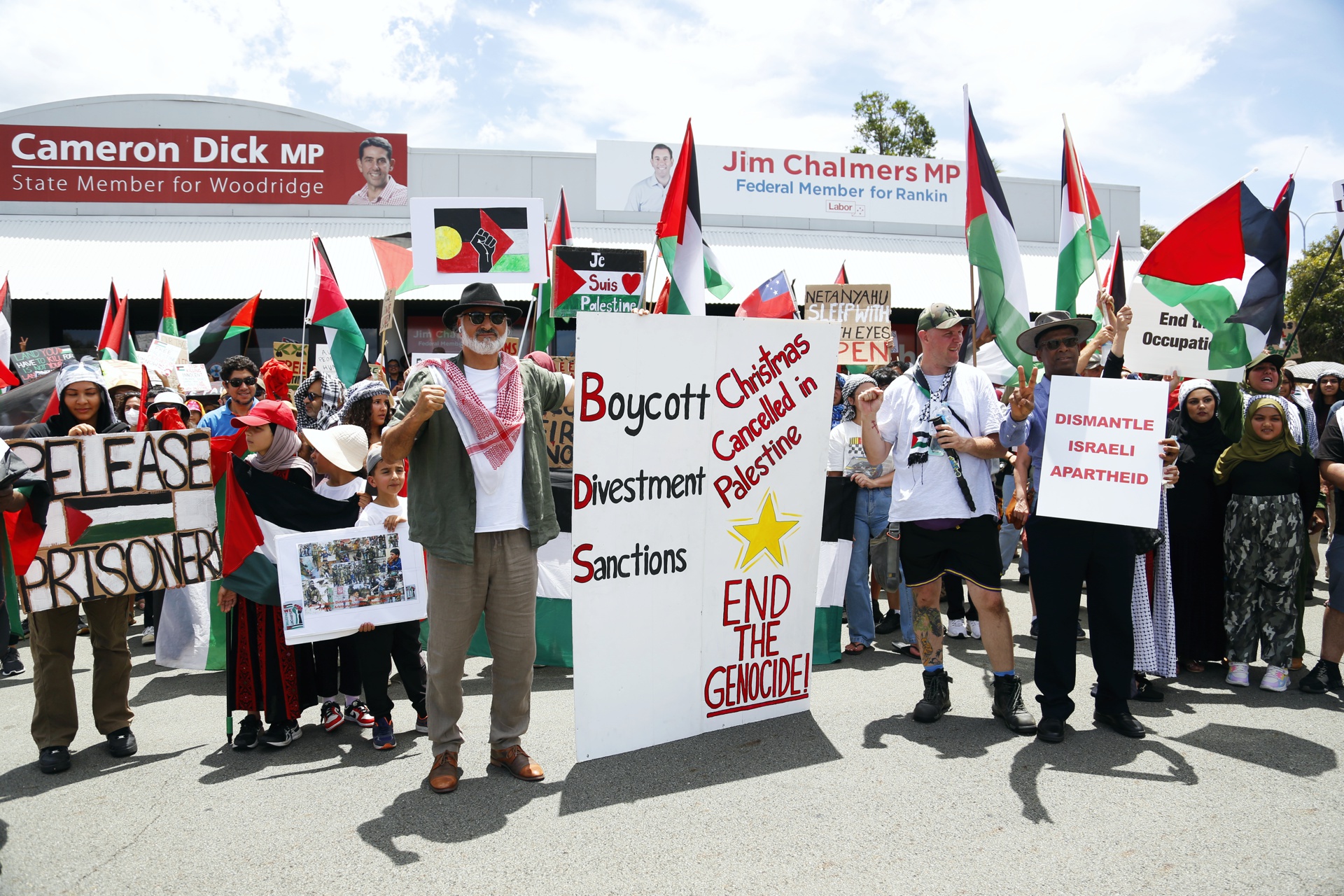 Protesting in front of Jim Chalmers' electoral office, December 3