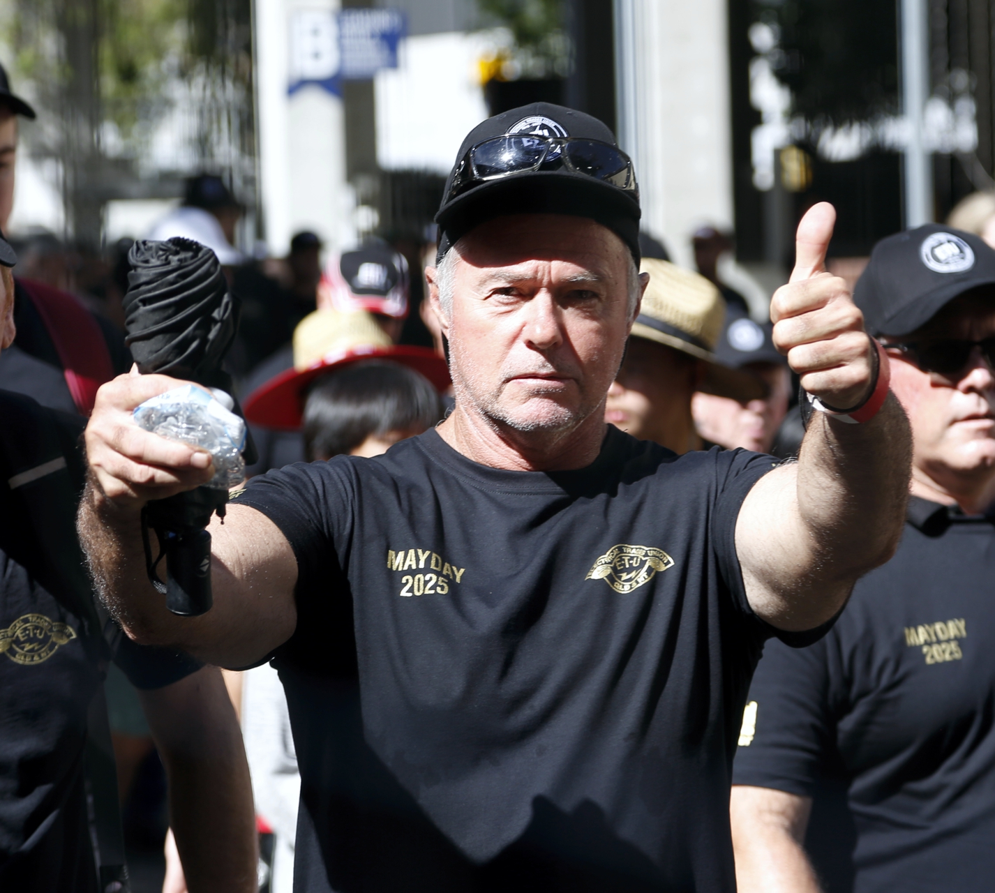 An Electrical Trades Union member gives the thumbs up, Magan-djin/Brisbane, May 5 An Electrical Trades Union member gives the thumbs up, Magan-djin/Brisbane, May 5