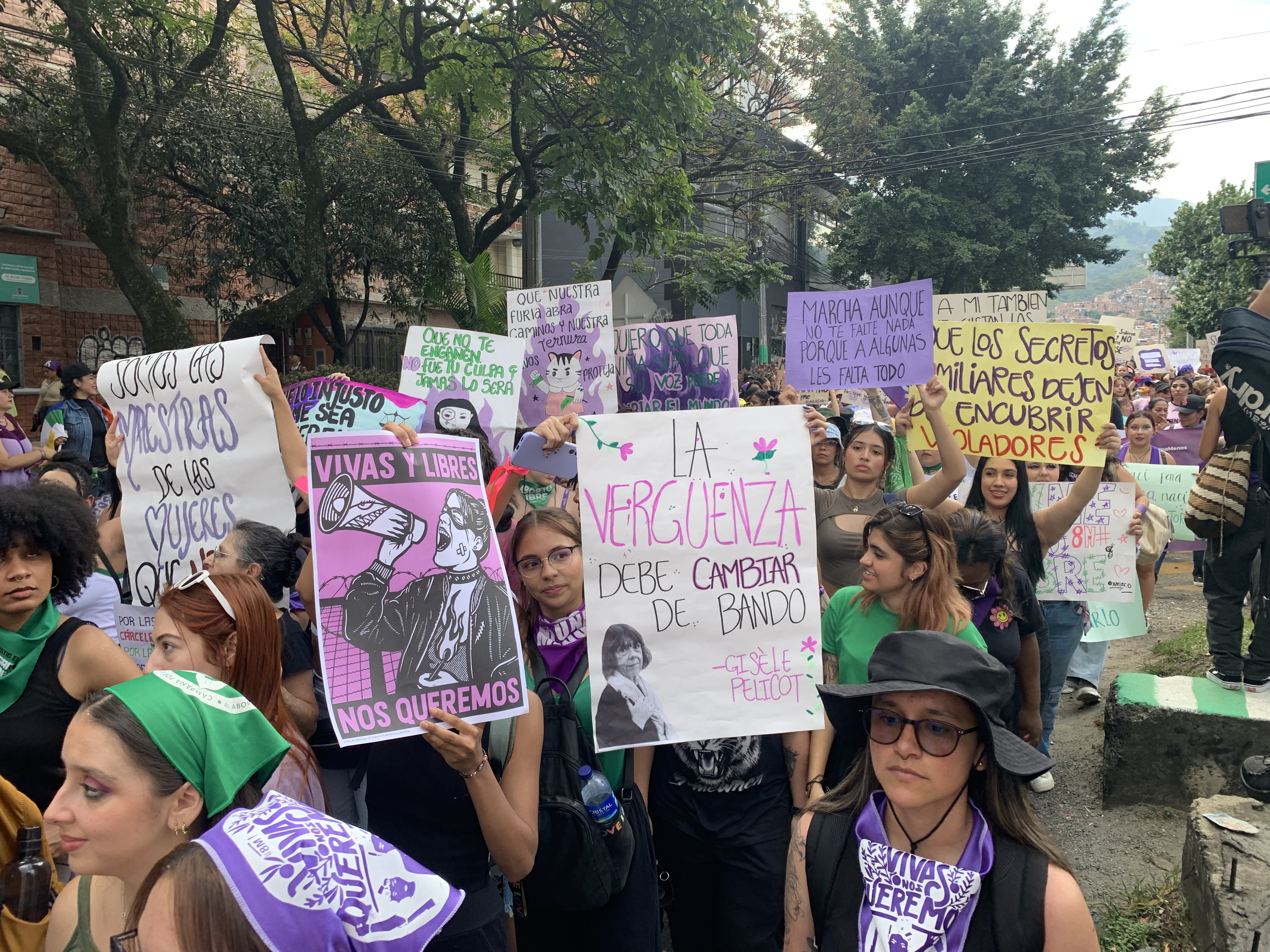women marching with signs