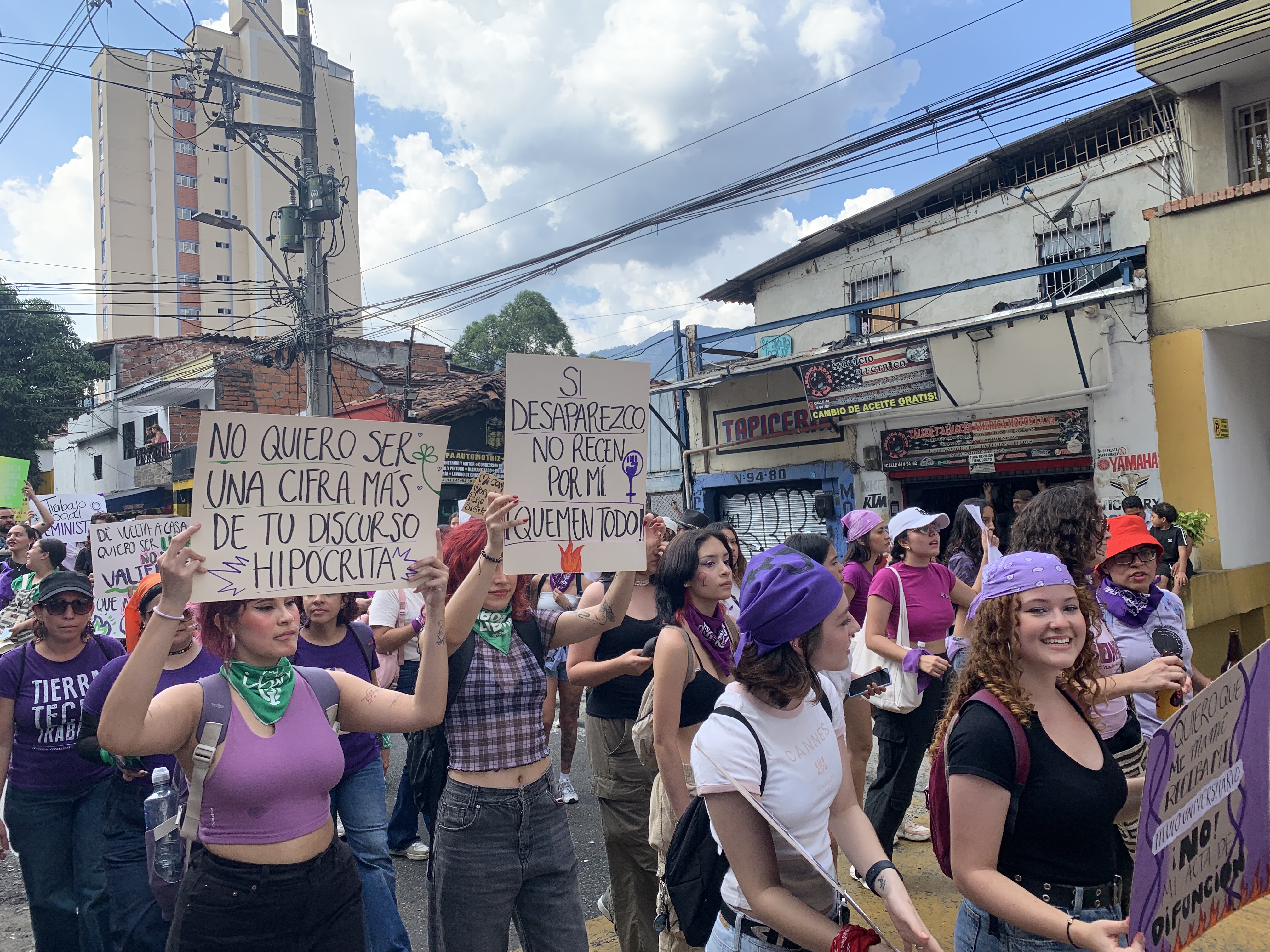 women marching with signs