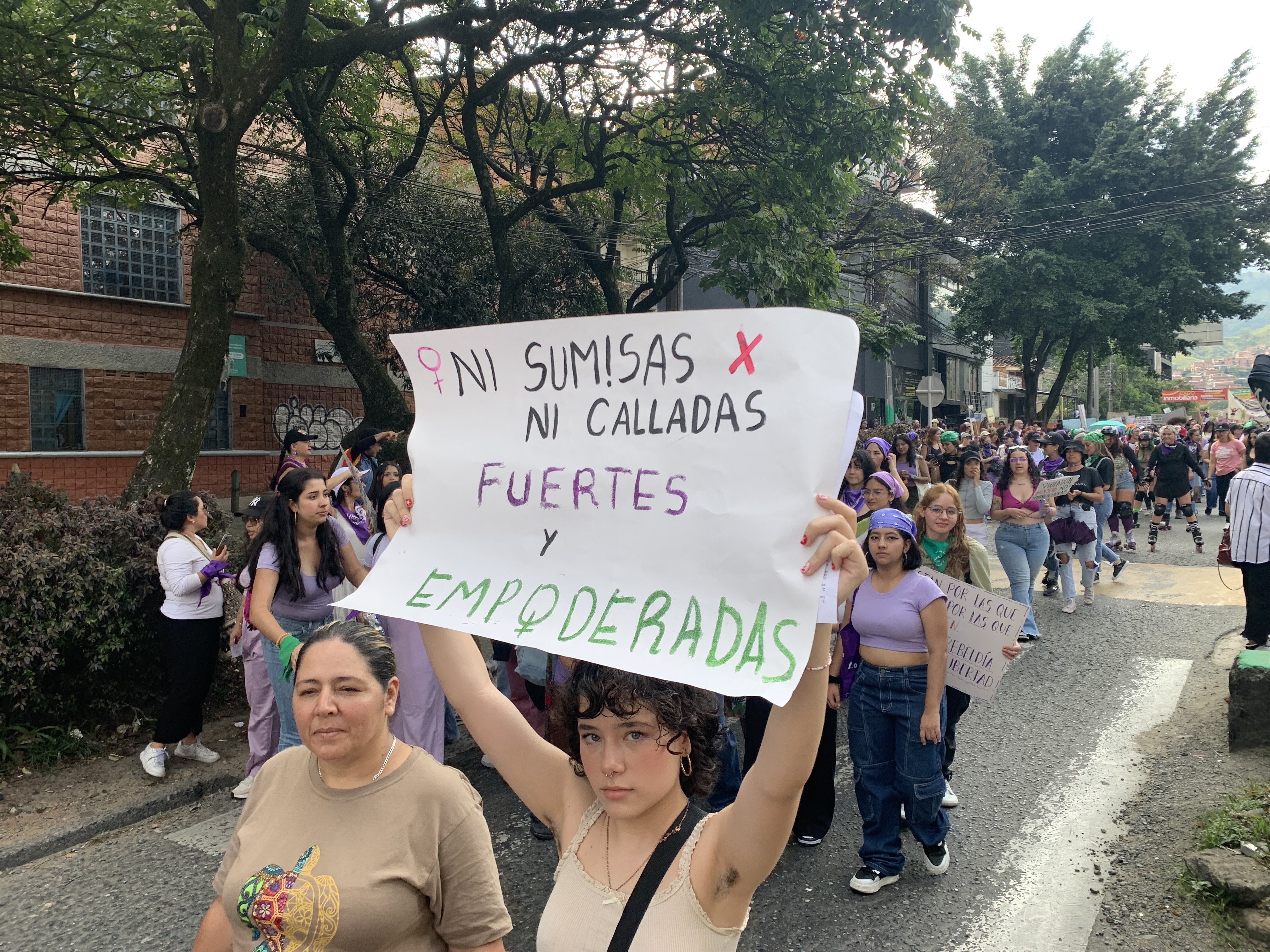various images of IWD march in Colombia