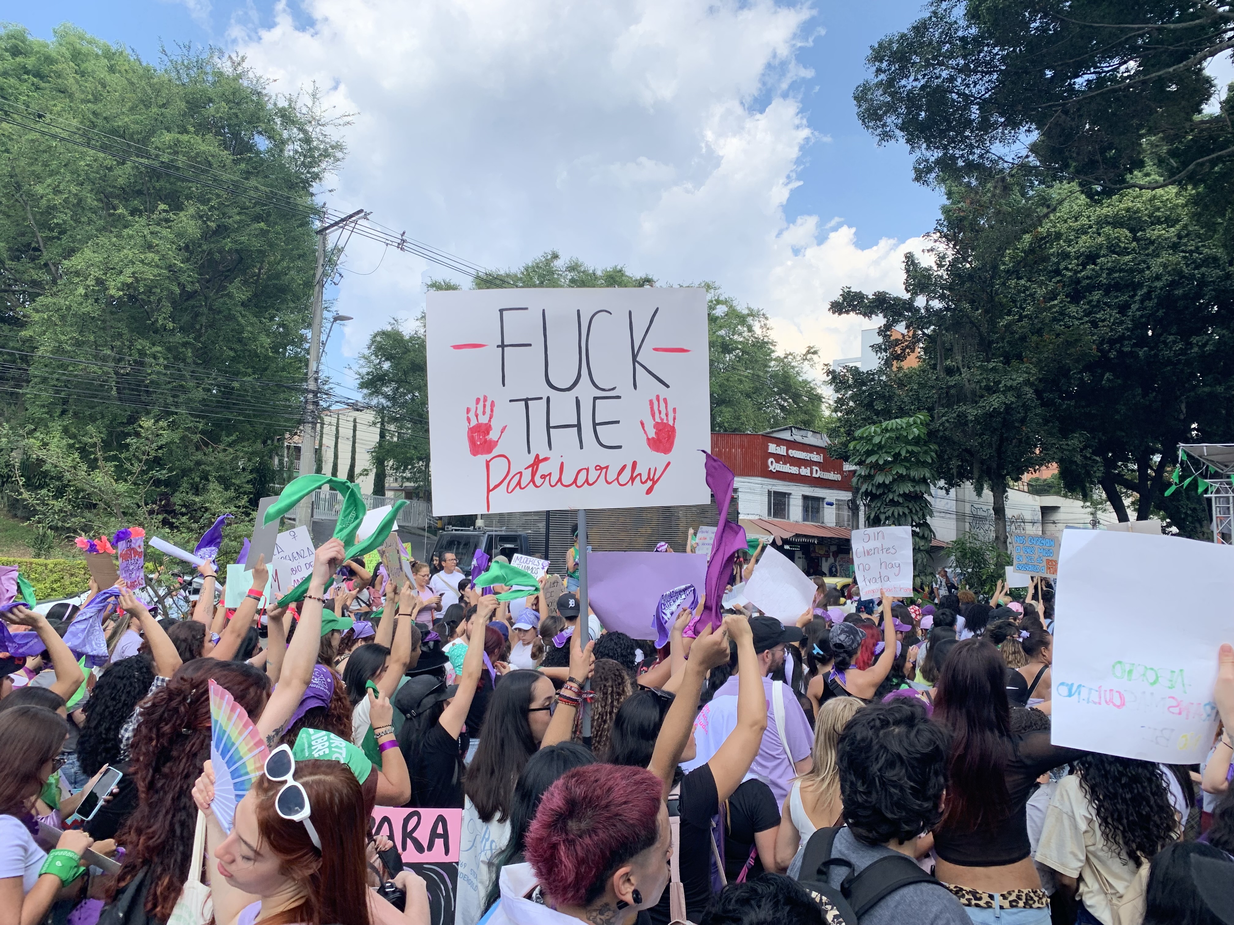 women marching with signs
