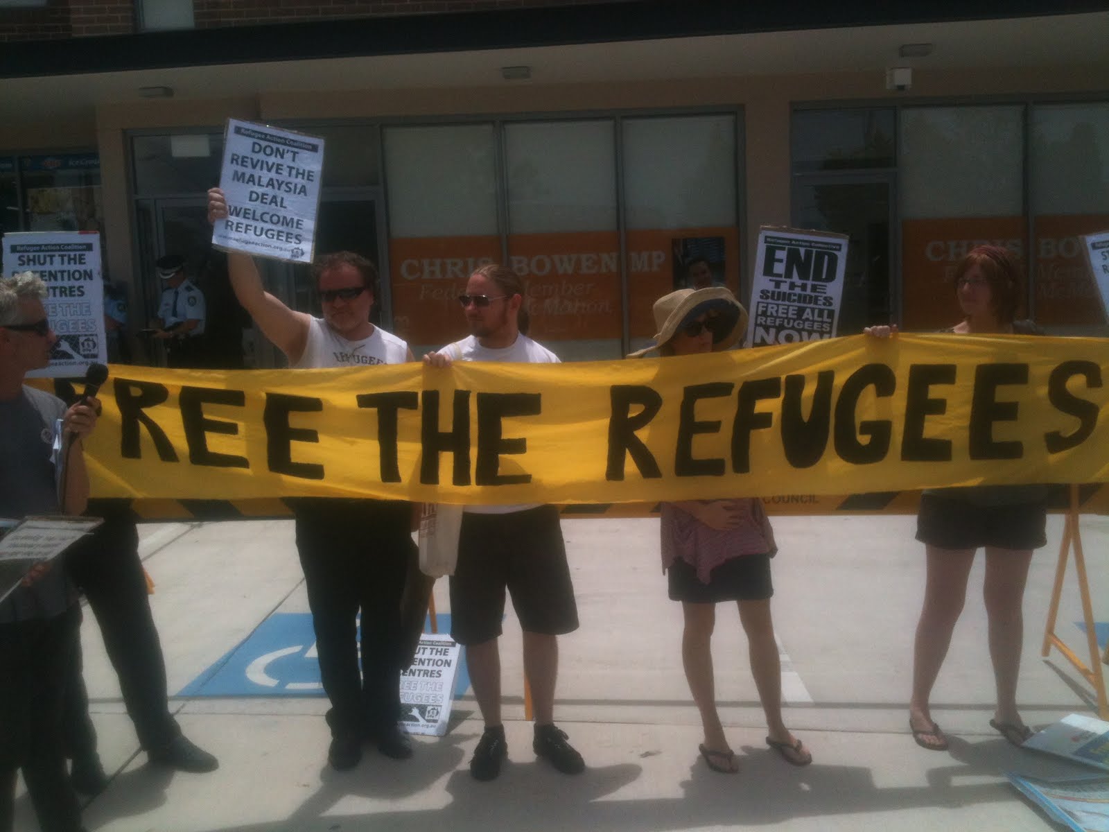 Refugee supporters rally outside Chris Bowen's office, Januray 10 2012.