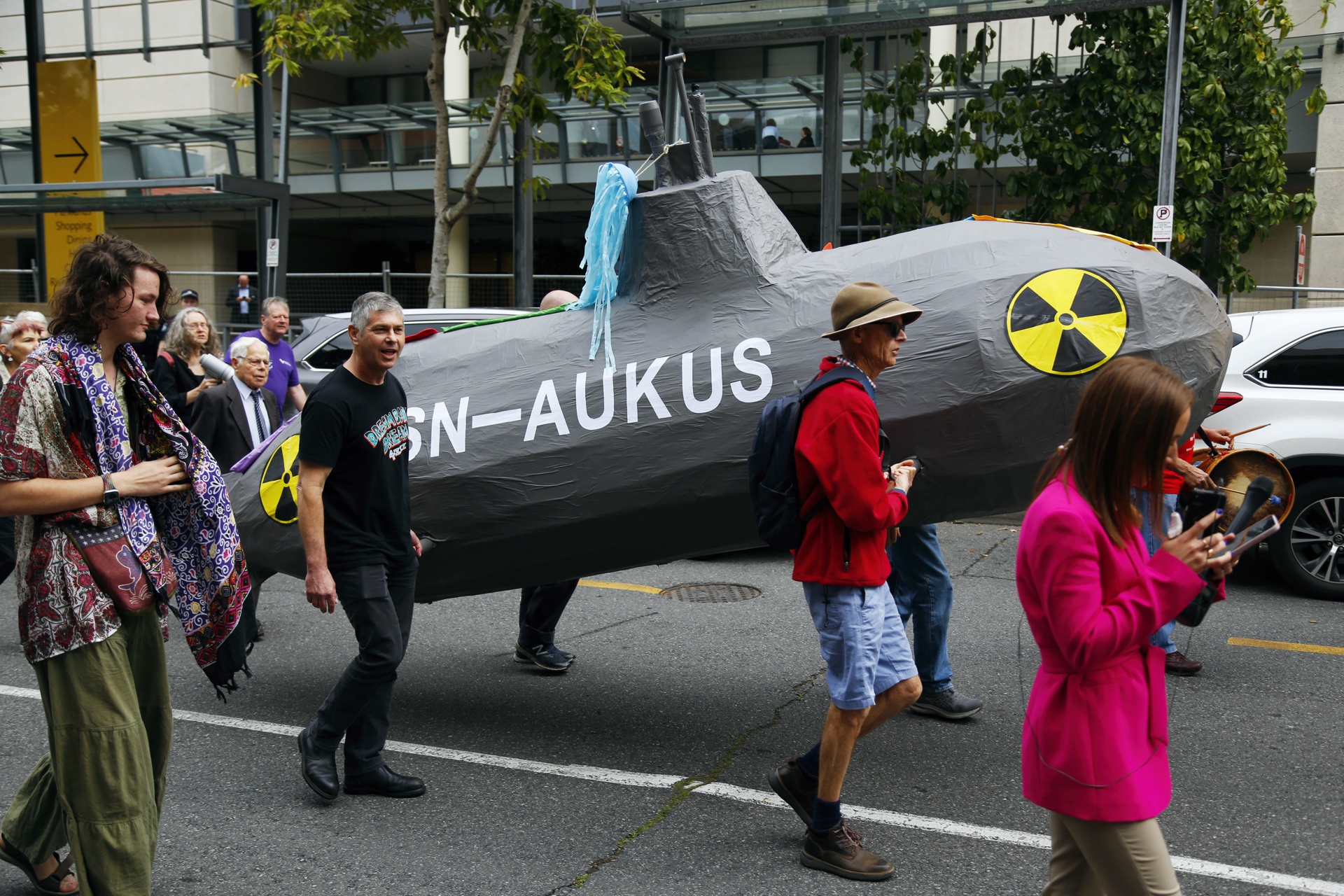 Marching with a giant submarine against AUKUS Marching with a giant submarine against AUKUS