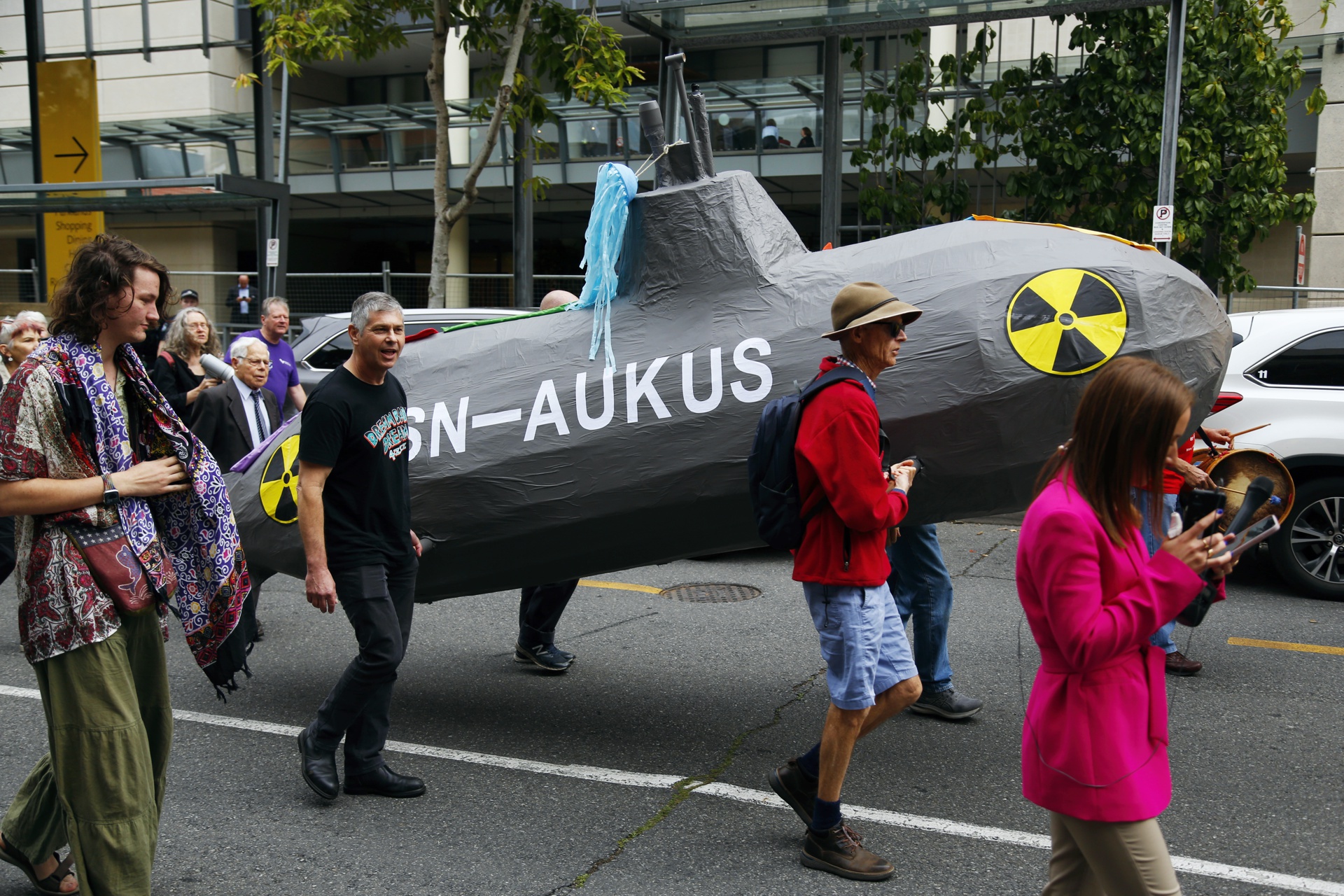 Marching with a giant submarine against AUKUS