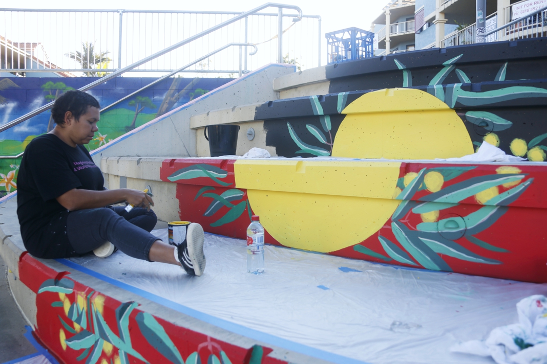 Aborginal flag mural being painted