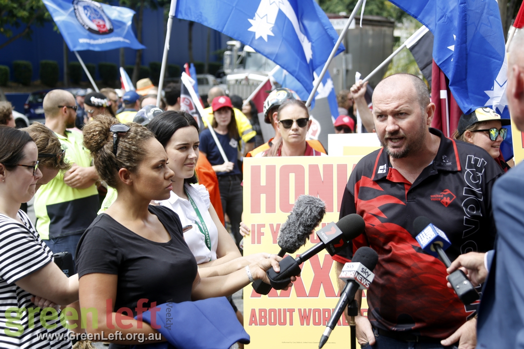 Damien Davie addresses media at rally