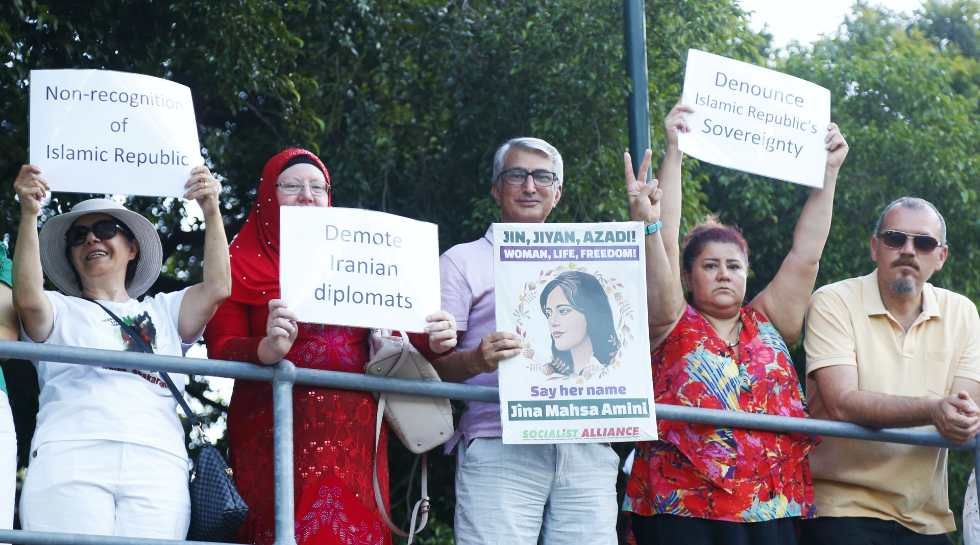 More placards by the river