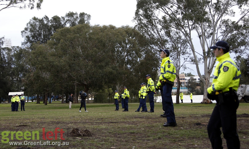 The entire operation was guarded by dozens of police.