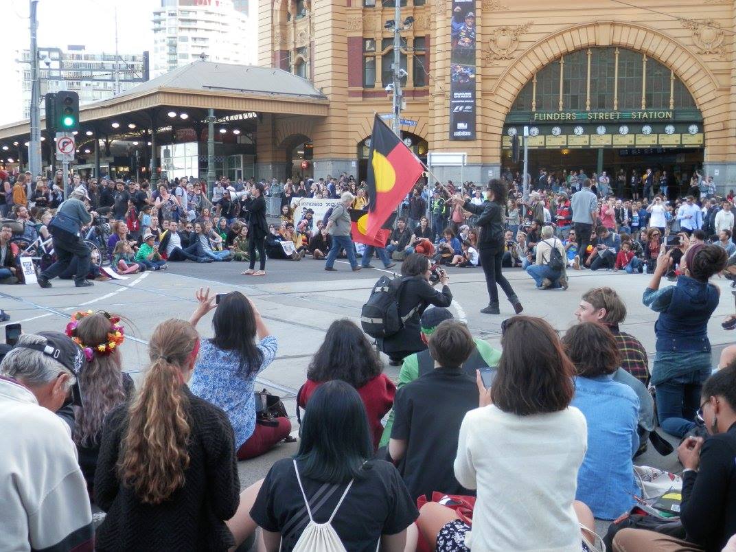 Protesters occupy Flinders Street at Flinders Street Station.