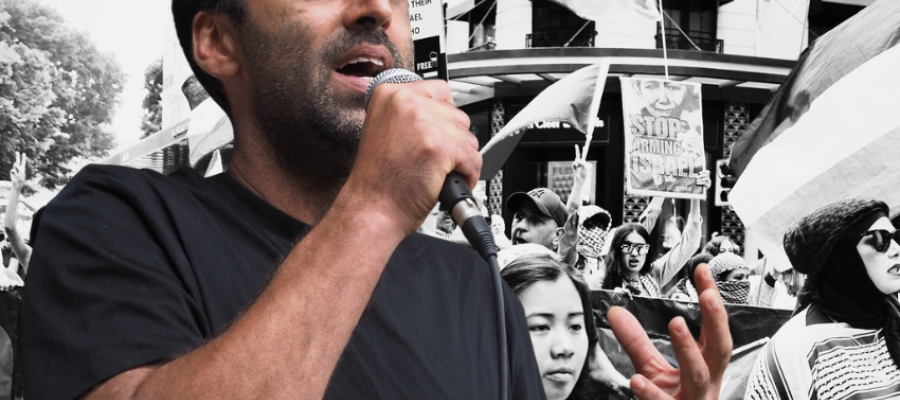 Surya McEwen against a backdrop of protesters