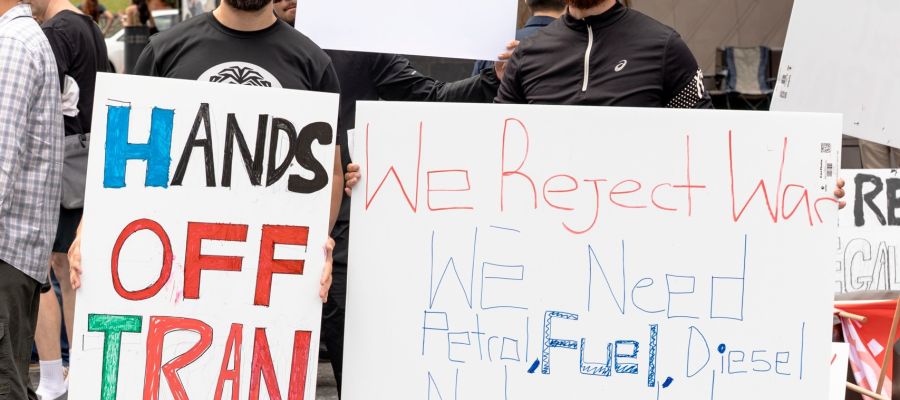 people holding signs