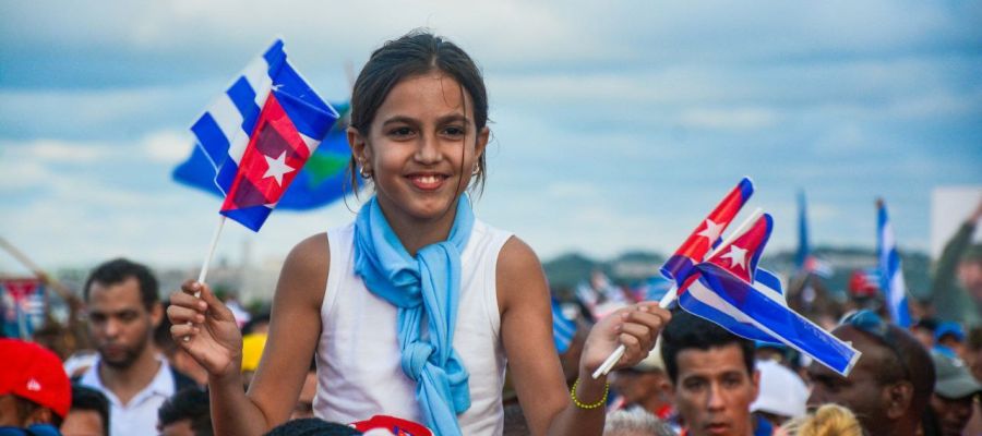Young girl with Cuban flags