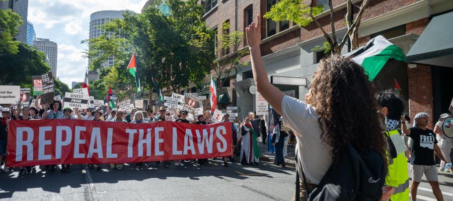 Justice for Palestine 'Repeal the laws' banner, April 19
