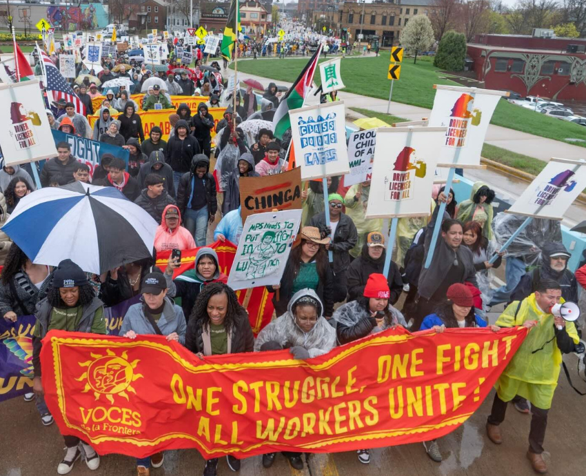 May Day protesters with banner