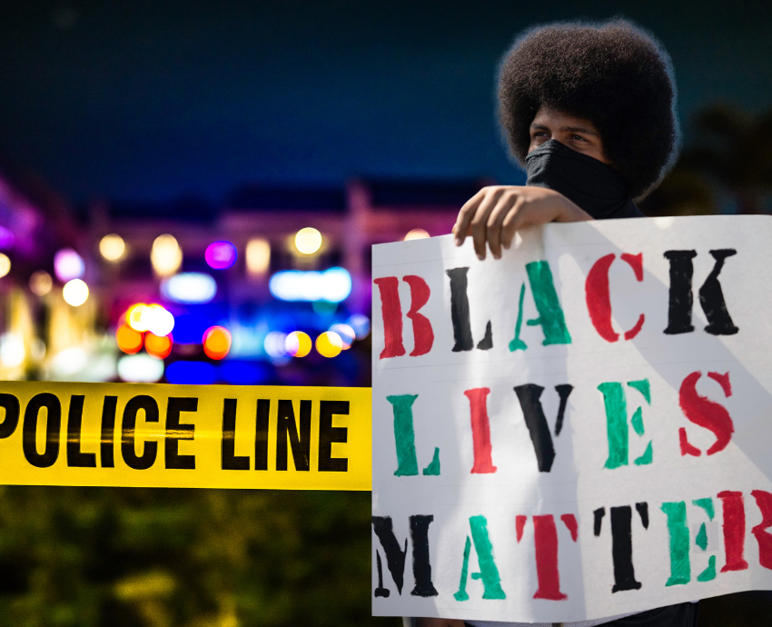 protester and police tape