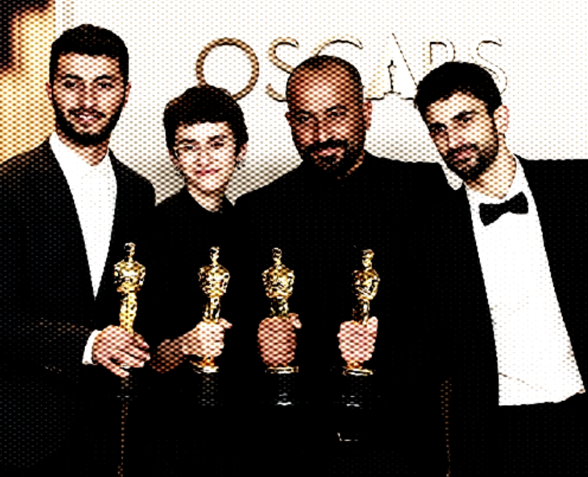four people holding trophies