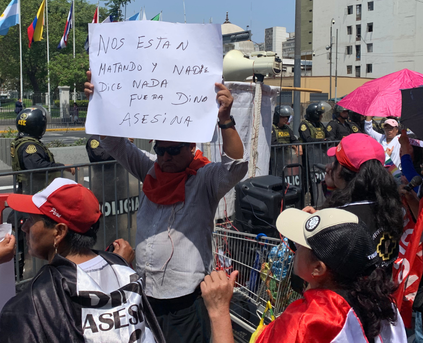 person holding a sign