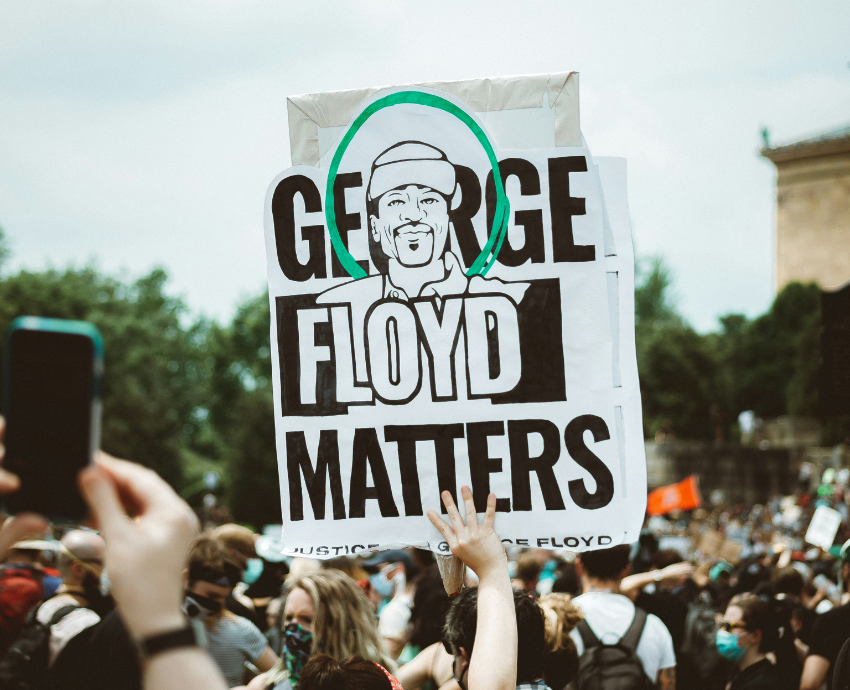 protester holding sign