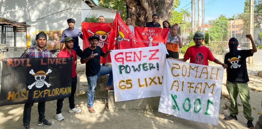 young protesters holding banners in Timor-Leste