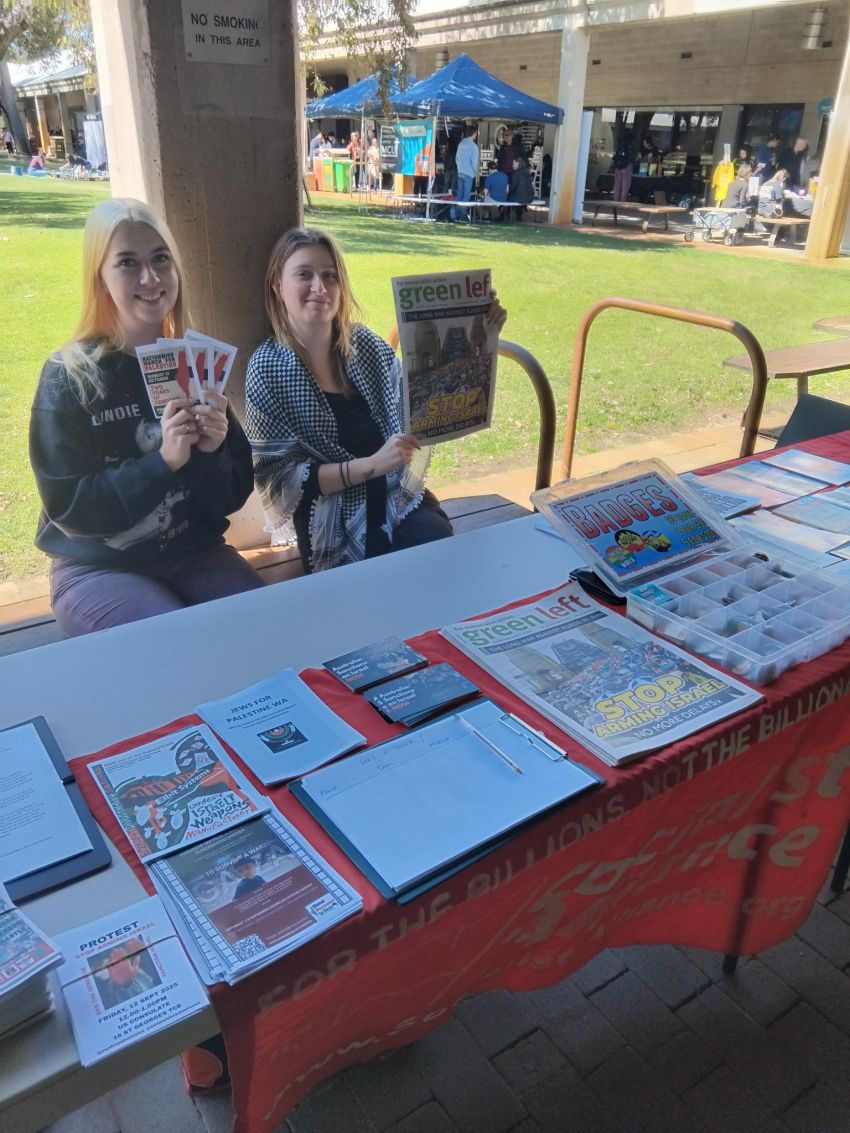 2 Socialist Alliance members at our stall