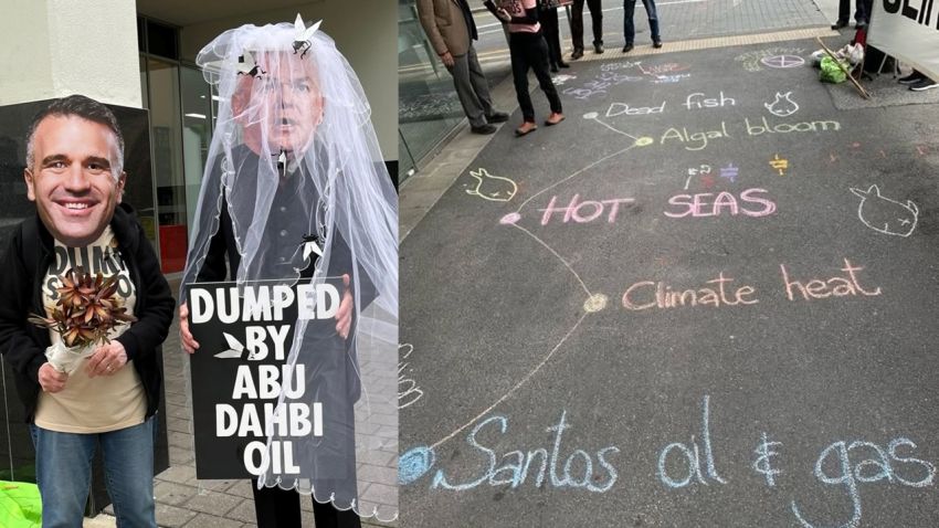 Extinction Rebellion protestors in costume and sidewalk chalk-up outside Santos office in Adelaide
