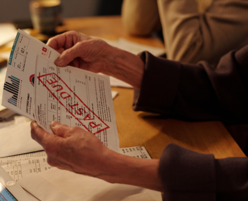 A person holding a debt notice