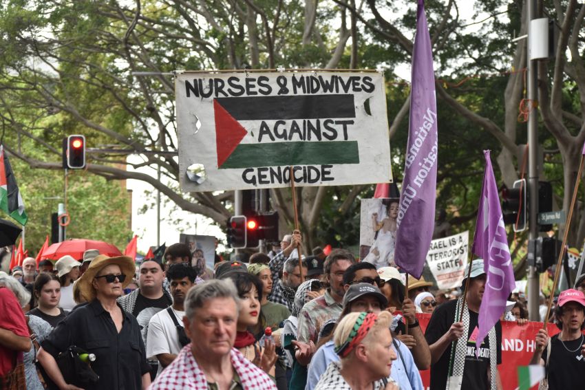 nurses and midwives against genocide banner