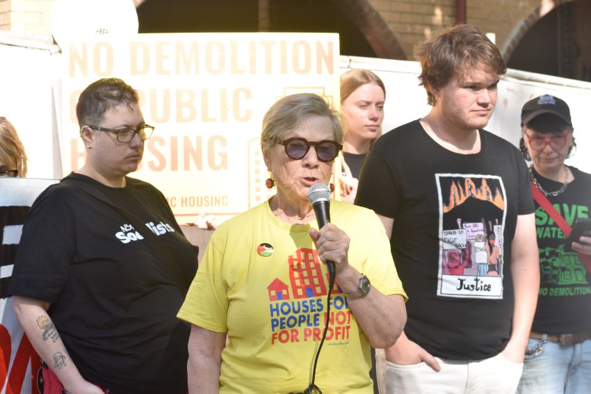 woman speaking into microphone