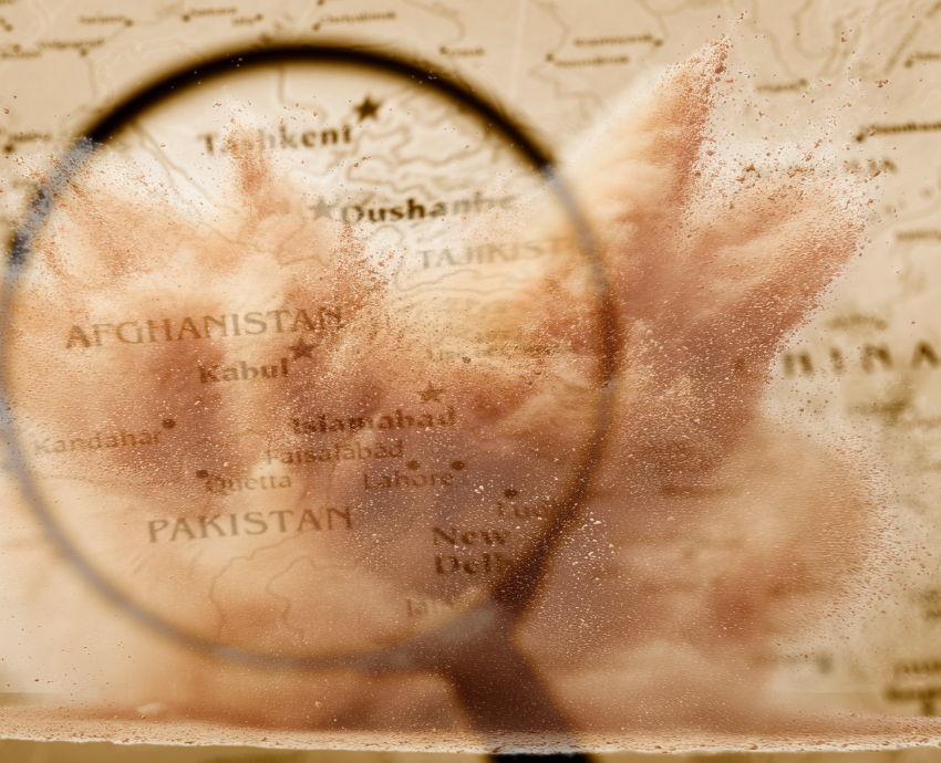 Map of Pakistan and Afghanistan with a magnifier and explosion
