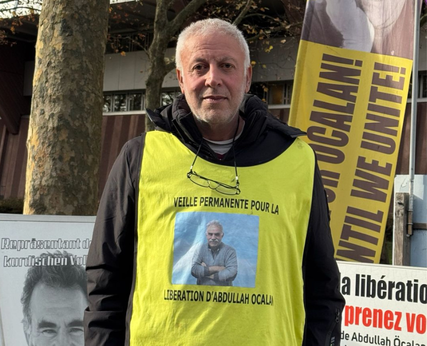 Man wearing a protest vest