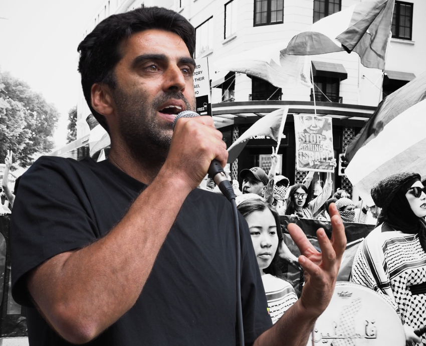 Surya McEwen against a backdrop of protesters