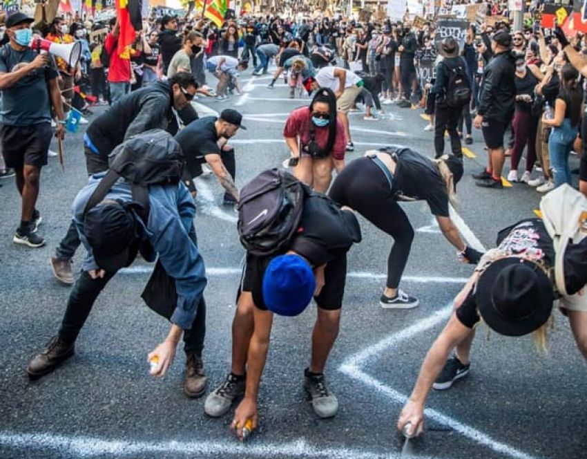 Cropped photo on Invasion Day Rally in Brisbane, year and photographer unknown.