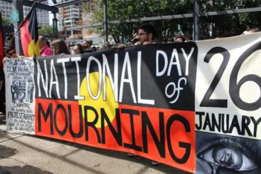 Photo of people holding banner at Sydney Day of Mourning 2016