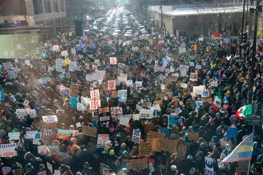 Thousands of protesters with signs in Minneapolis