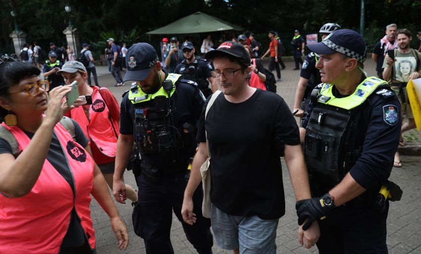 Two activists were arrested at the rally for expressing Palestine freedom slogans