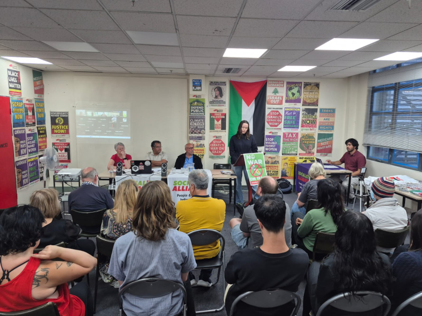 a packed room at the melbourne resistance centre for a forum on the war with iran