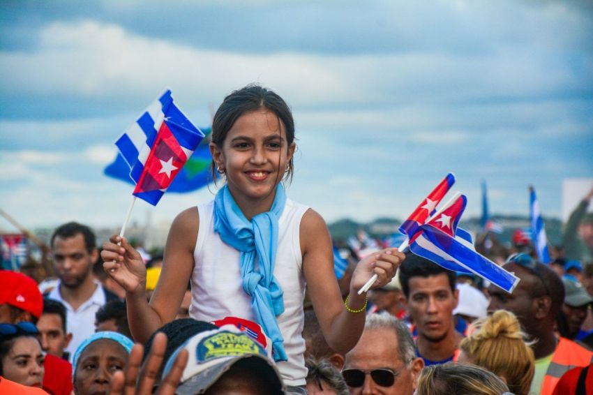 Young girl with Cuban flags