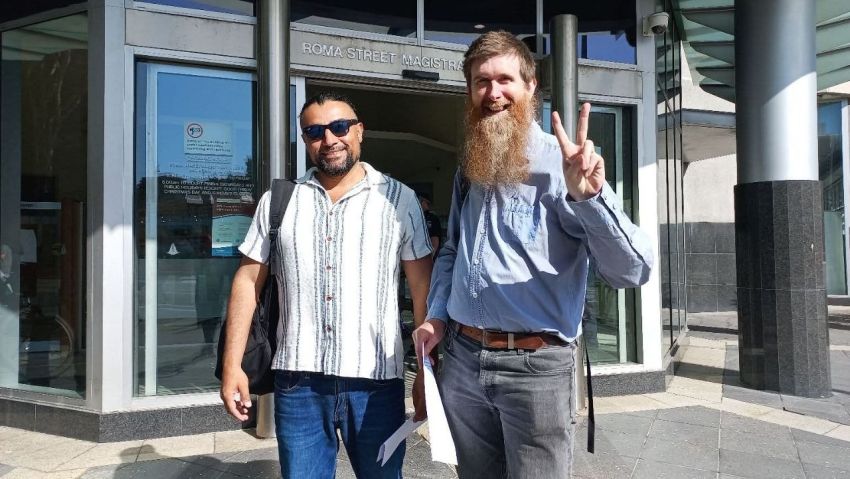 Luciano Raygosa and Alex Bainbridge coming out of court, May 5