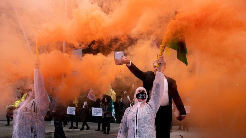 Dramatic image with smoke from a climate protest
