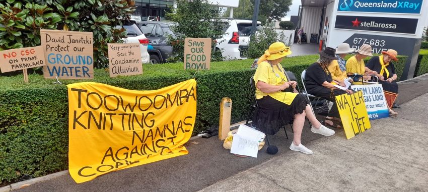 Photo of the Toowoomba Knitting Nannas Against Coal & Gas outside David Janetzki's office