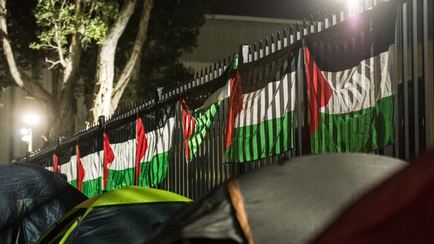 Tents and Palestinian flags at a picket of Bisalloy Steel.