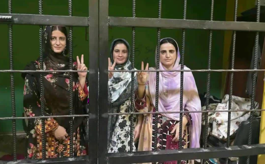 3 women behind bars