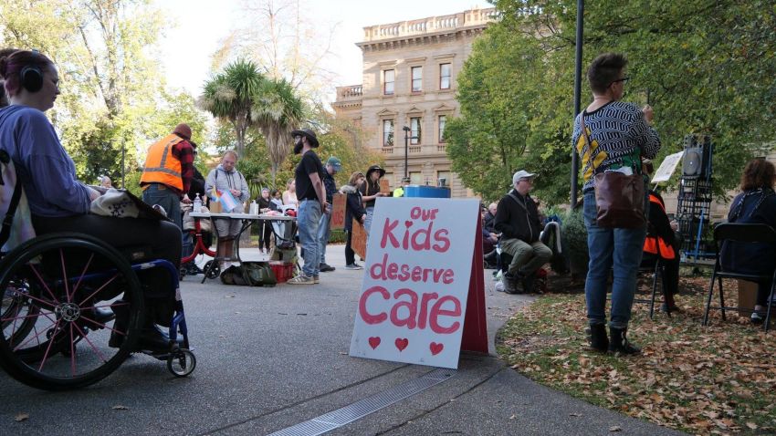 A photo of protestors at a Protect Our NDIS rally in Nipaluna / Hobart.