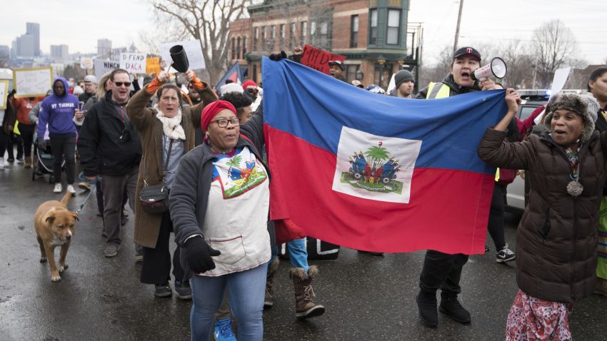 protesters carrying banners