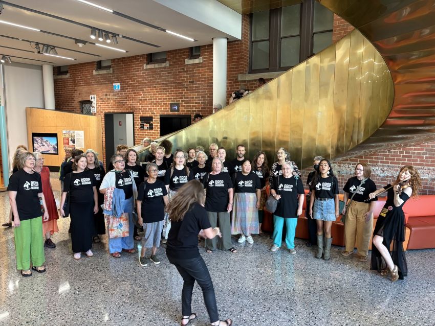 Choir members performing